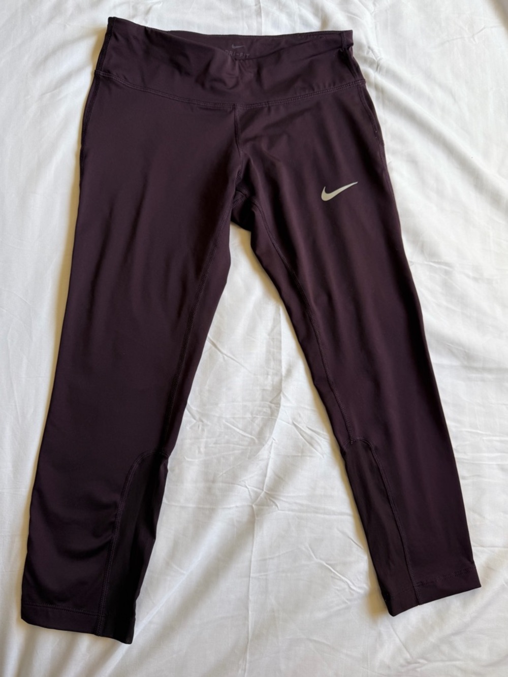 Nike Women’s Dark Plum Athletic Leggings with Reflective Swoosh